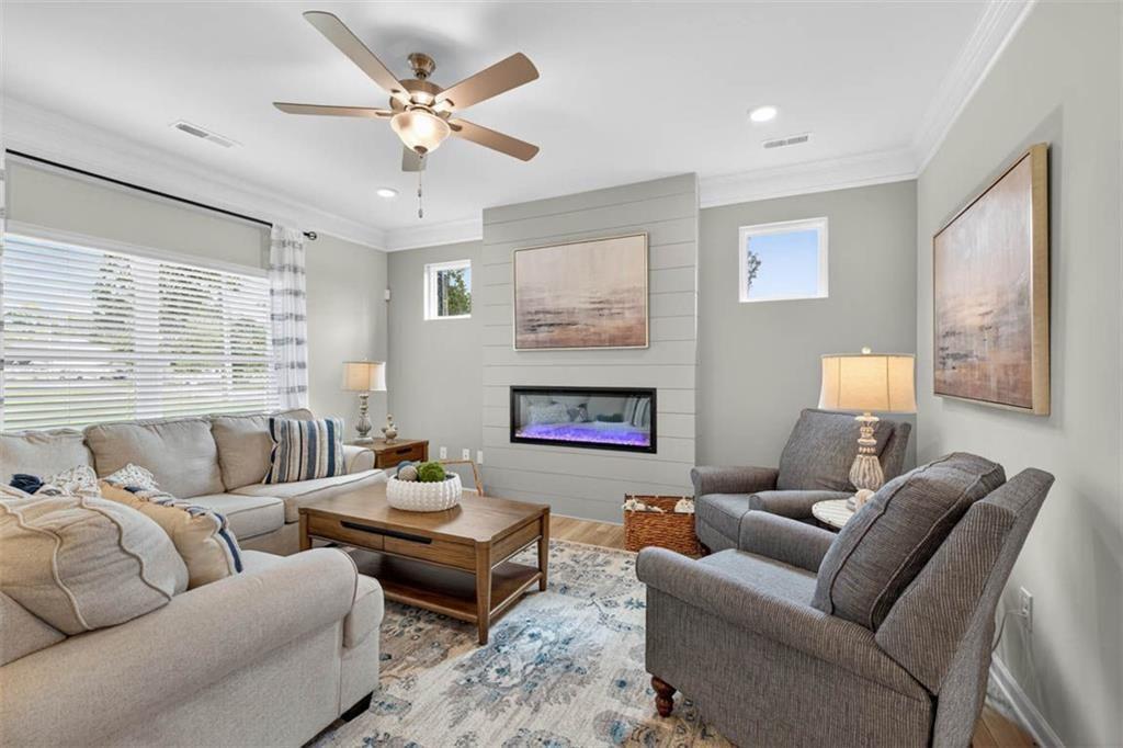 532 Guy Williams Road Rock Spring, GA 30739 - Photo 13 of 42 a living room with furniture and a large window