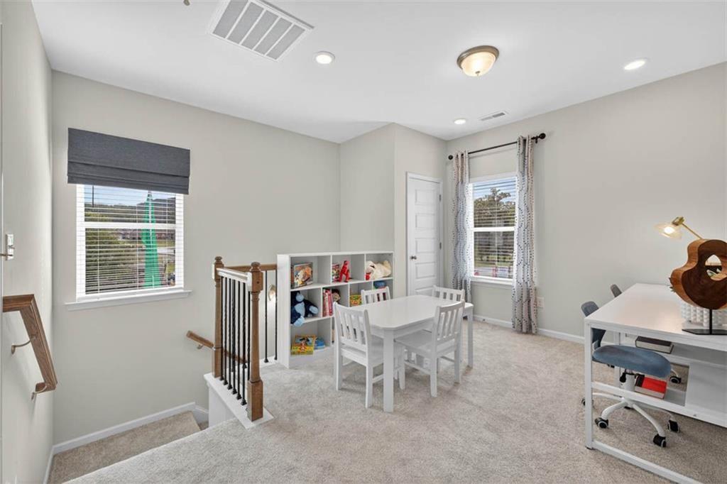 532 Guy Williams Road Rock Spring, GA 30739 - Photo 19 of 42 a room with furniture a air conditioner vent and a window