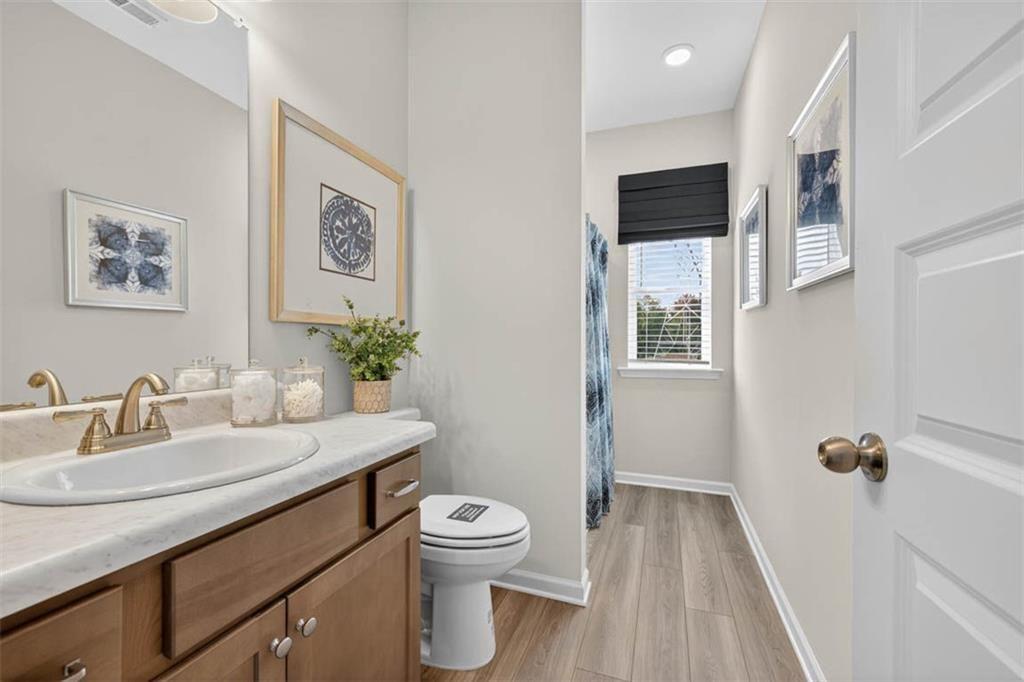532 Guy Williams Road Rock Spring, GA 30739 - Photo 25 of 42 a bathroom with a sink a toilet and shower