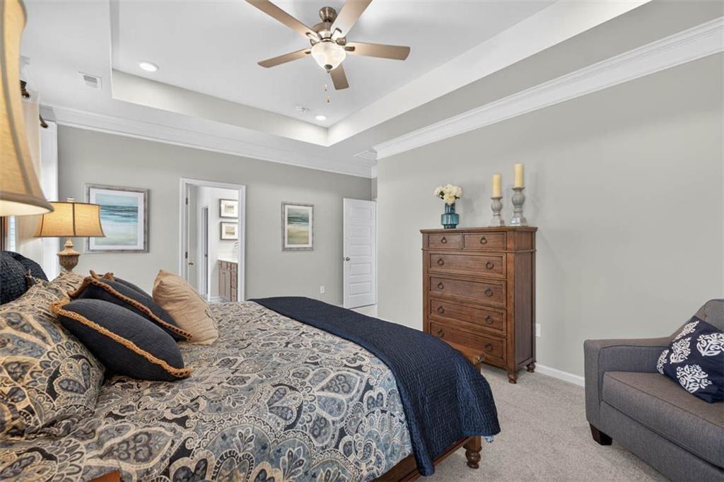 532 Guy Williams Road Rock Spring, GA 30739 - Photo 29 of 42 a bedroom with a bed and furniture