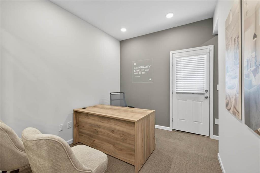 532 Guy Williams Road Rock Spring, GA 30739 - Photo 39 of 42 a bathroom with a toilet a sink and mirror