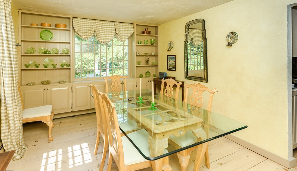 32 Century Mill Road Bolton, MA 01740 - Photo 14 of 27 a dining room with a table and chairs