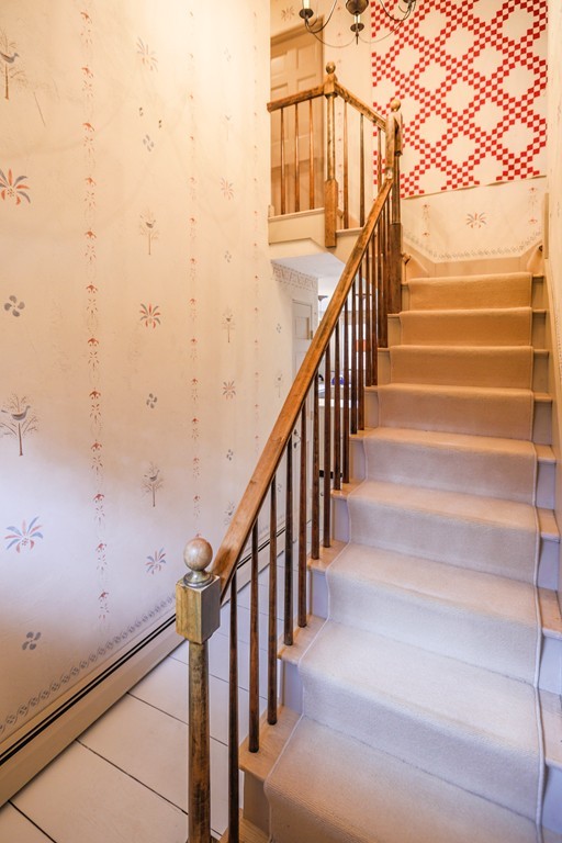 32 Century Mill Road Bolton, MA 01740 - Photo 18 of 27 a view of staircase with wooden floor and white walls