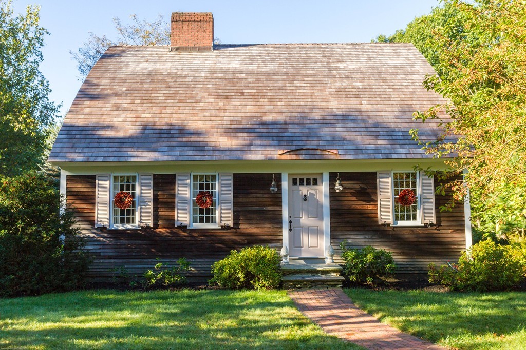 32 Century Mill Road Bolton, MA 01740 - Photo 2 of 27 a front view of a house with a yard