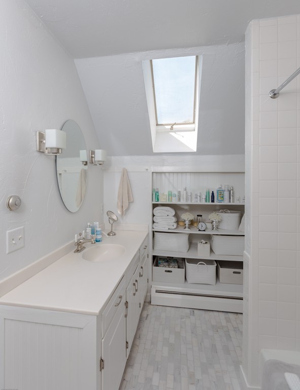 32 Century Mill Road Bolton, MA 01740 - Photo 21 of 27 a bathroom with a sink and a mirror
