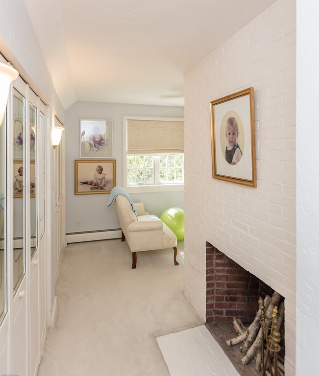 32 Century Mill Road Bolton, MA 01740 - Photo 23 of 27 a living room with furniture and a painting on the wall