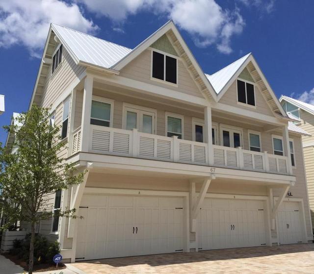 88 Pine Lands Loop Inlet Beach, Unit E A Inlet Beach, FL 32461 - Photo 1 of 11 a view of a house with a garage