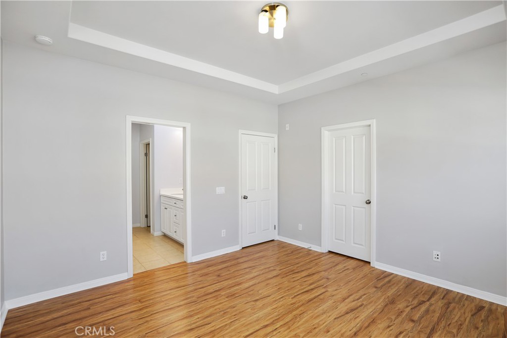 10 Nature Irvine, CA 92620 - Photo 13 of 27 a view of empty room with wooden floor