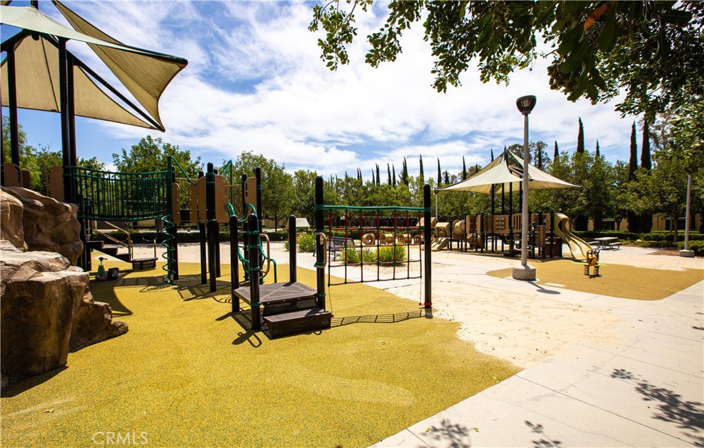 10 Nature Irvine, CA 92620 - Photo 25 of 27 a view of a swimming pool with a patio