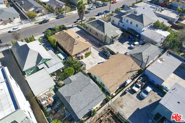 an aerial view of a house with outdoor space