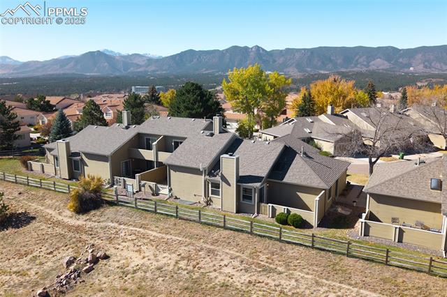 86 Rising Sun Terrace Colorado Springs, CO 80921 - Photo 32 of 36 Aerial perspective of suburban area with a mountain backdrop
