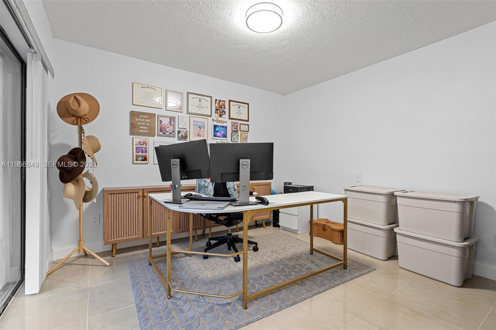 6554 Southwest 114th Place, Unit E74 Miami, FL 33173 - Photo 15 of 51 spacious 3rd bedroom downstairs currently used as an office.