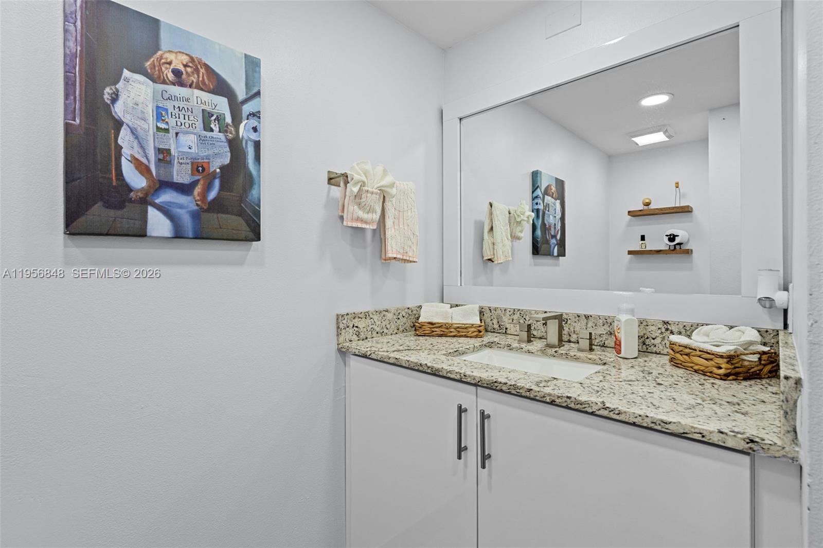 6554 Southwest 114th Place, Unit E74 Miami, FL 33173 - Photo 17 of 51 Powder room with granite counter top!
