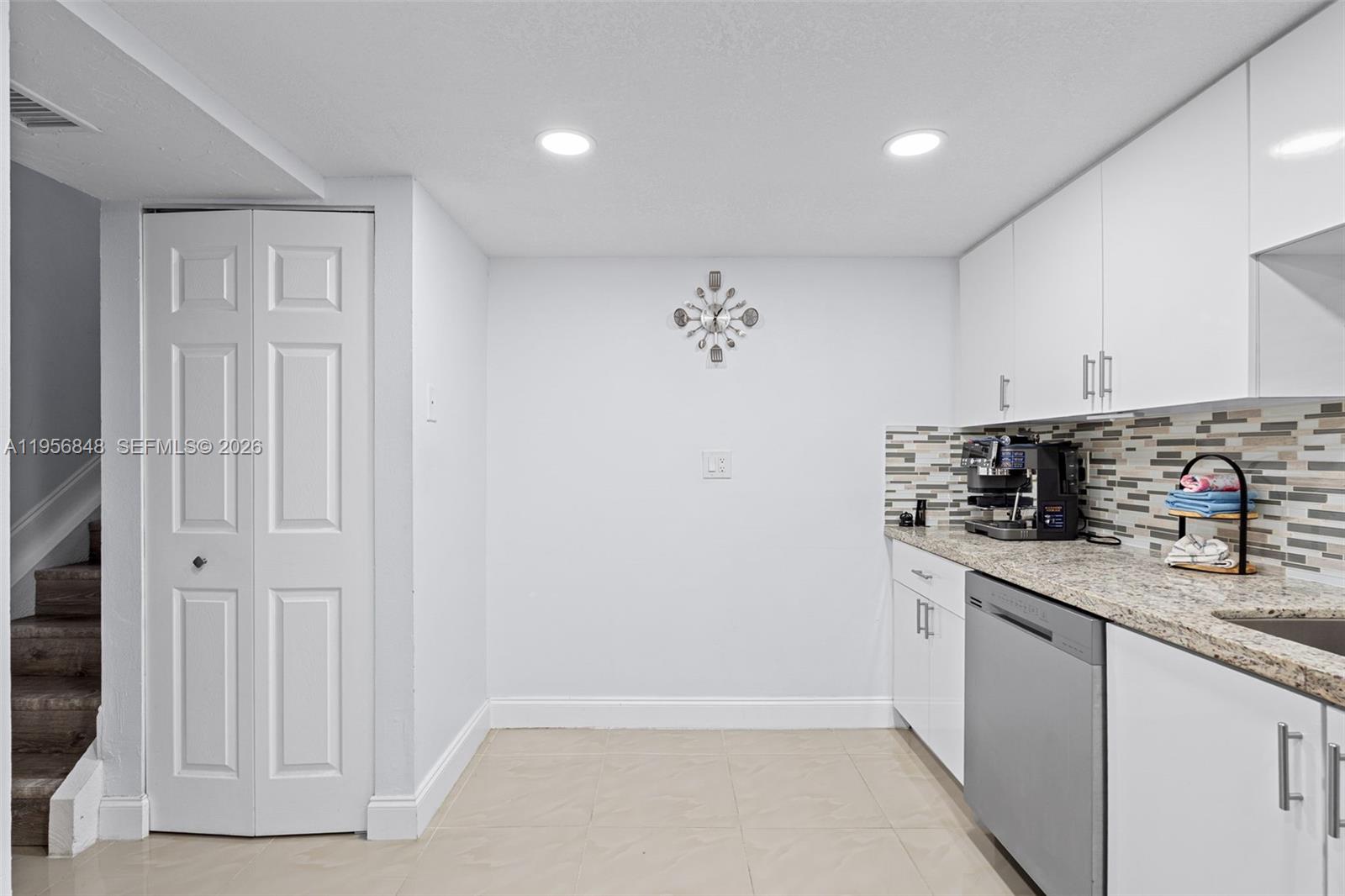 6554 Southwest 114th Place, Unit E74 Miami, FL 33173 - Photo 23 of 51 View 3 of 3 of the kitchen (shows space for more cabinets or a small coffee table!).