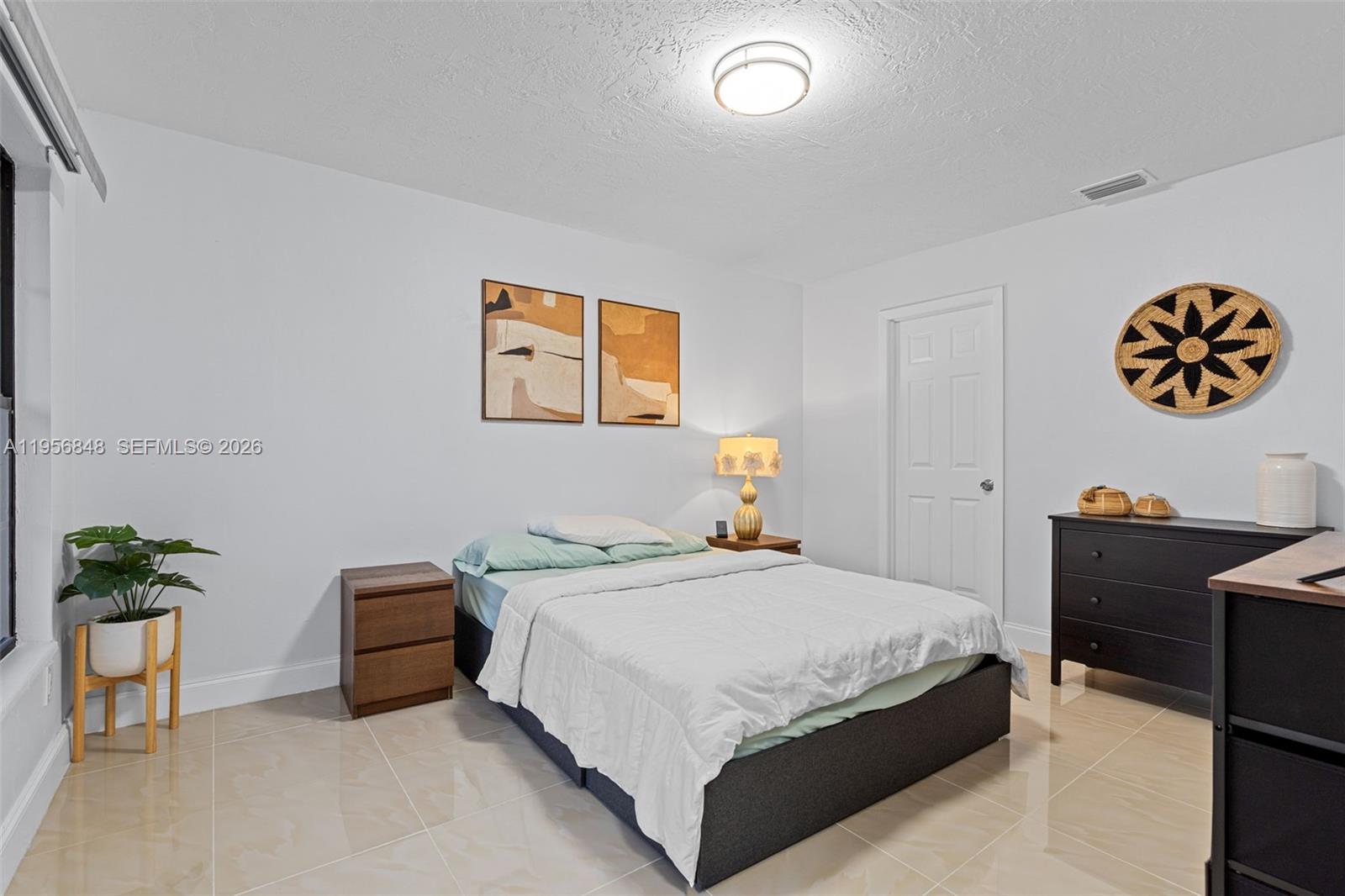 6554 Southwest 114th Place, Unit E74 Miami, FL 33173 - Photo 24 of 51 1st master suite.