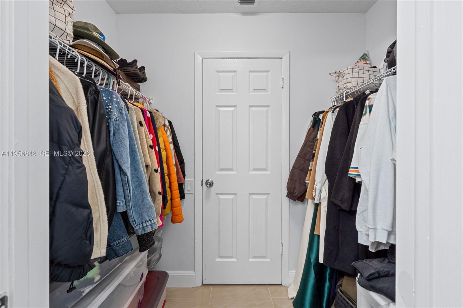 6554 Southwest 114th Place, Unit E74 Miami, FL 33173 - Photo 26 of 51 Walk-in closet of 1st master suite.