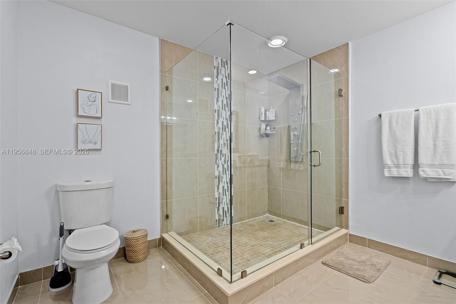 6554 Southwest 114th Place, Unit E74 Miami, FL 33173 - Photo 33 of 51 We knew you'll prefer a walk-in shower over a tub and here it is!