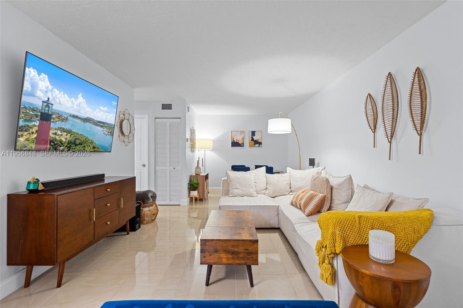 6554 Southwest 114th Place, Unit E74 Miami, FL 33173 - Photo 10 of 51 Big couch = Comfortable movie nights!