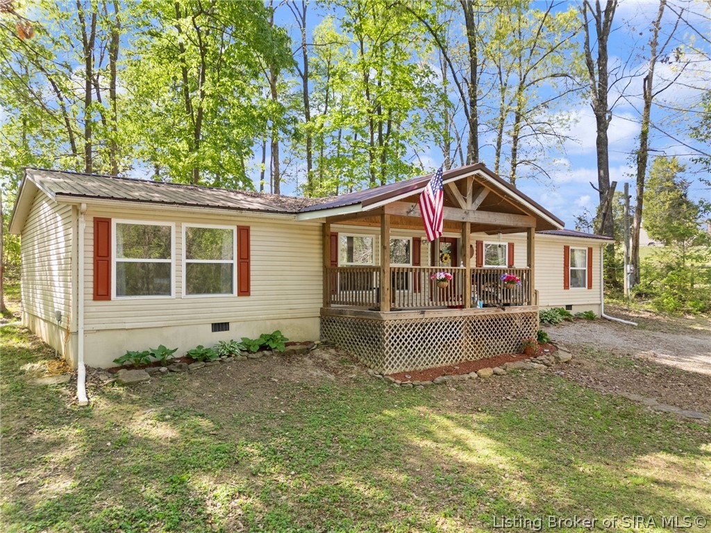 SITS ON ONE ACRE IN THE MIDDLE OF WOODS