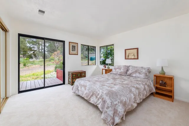 a bathroom with a shower and a sink
