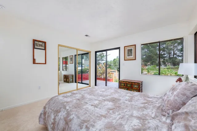 a bathroom with a sink a mirror and a window