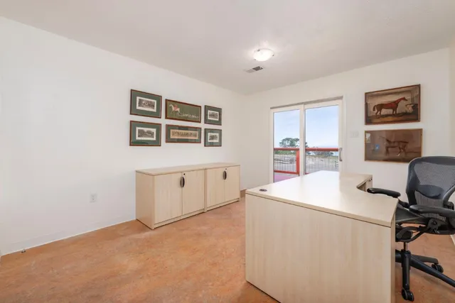 a bathroom with a granite countertop sink a shower and a mirror