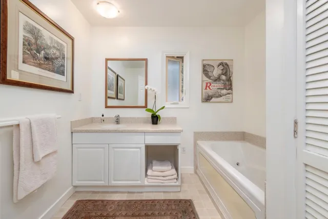 a view of a balcony with wooden floor