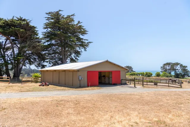 a view of a swimming pool and an outdoor space