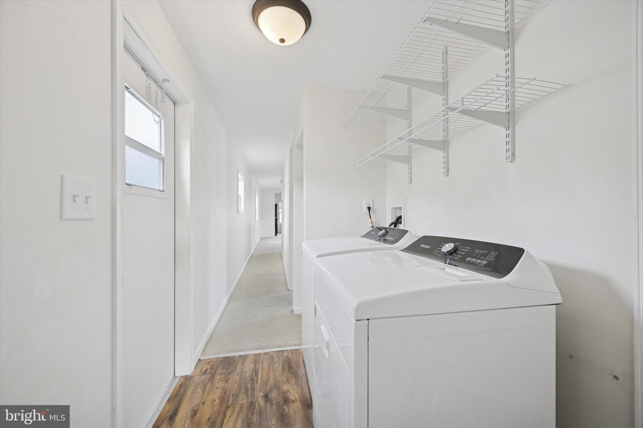 326 Delta Road Wilmington, DE 19810 - Photo 15 of 17 a utility room with dryer and washer