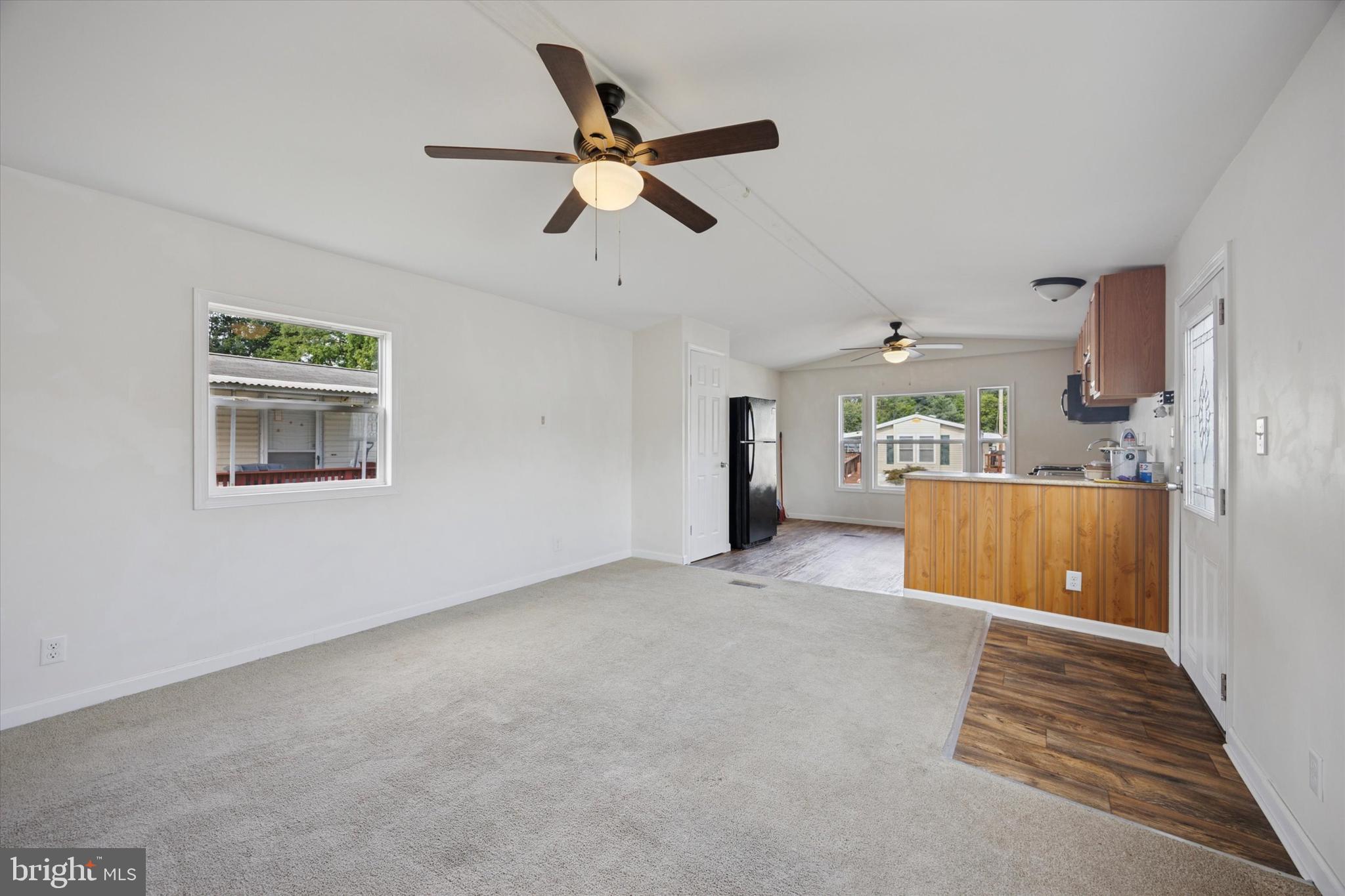 326 Delta Road Wilmington, DE 19810 - Photo 7 of 17 a view of workspace with wooden floor and ceiling fan