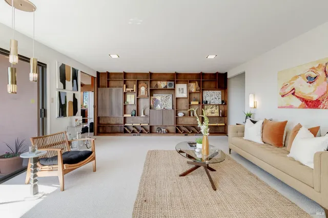 a view of an outdoor dining space with furniture