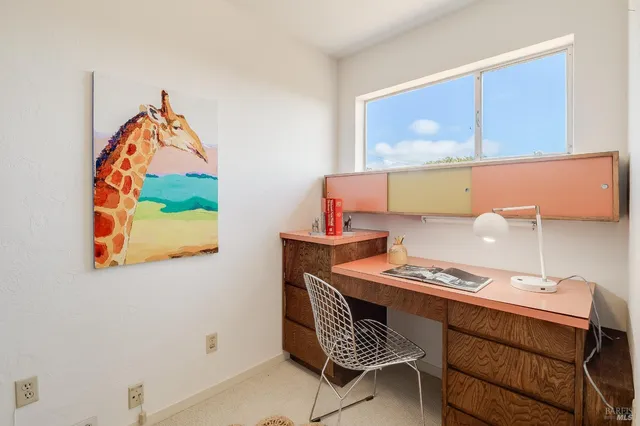 a kitchen with stainless steel appliances kitchen island granite countertop a stove a sink and a microwave