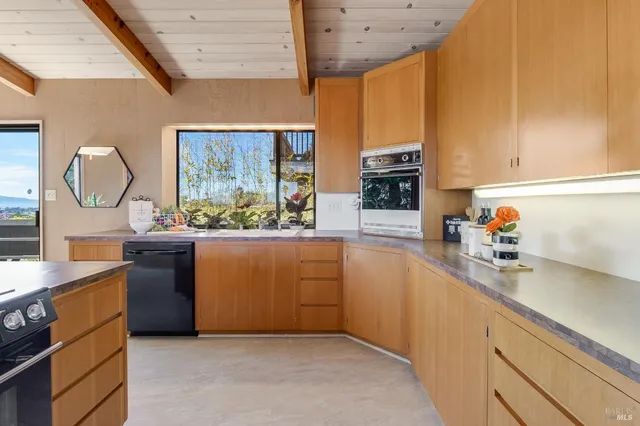a view of a livingroom from a hallway