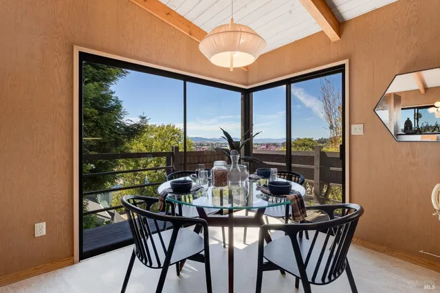 a bed room with a bed and a television