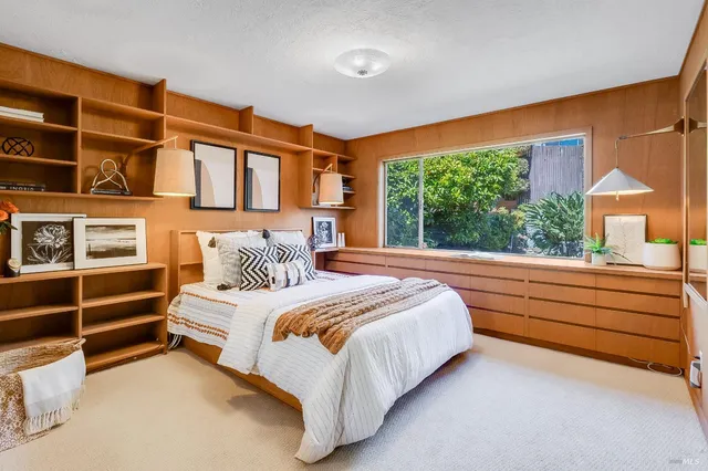 a bathroom with a sink vanity and a mirror