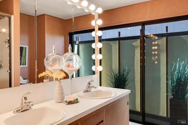 a view of a house with a small yard and plants