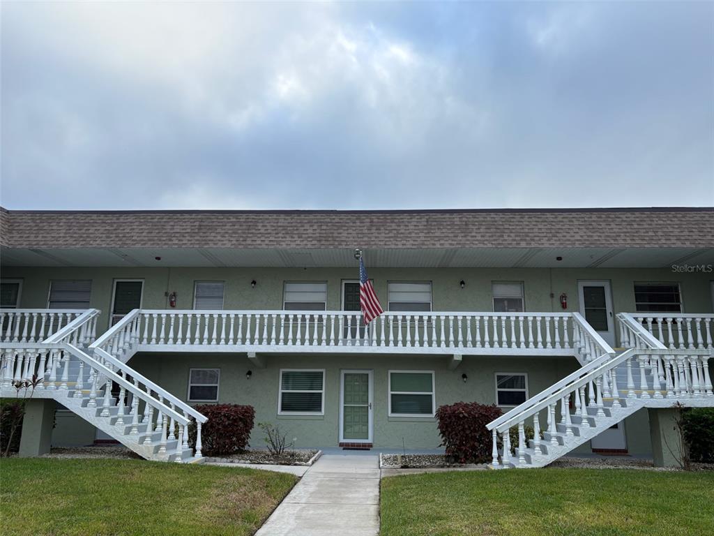 a view of a house with a roof deck