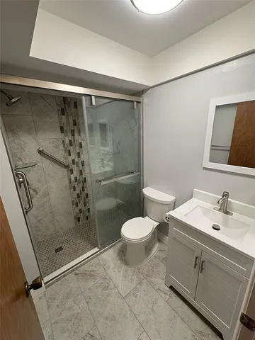 a kitchen with a stove and a sink