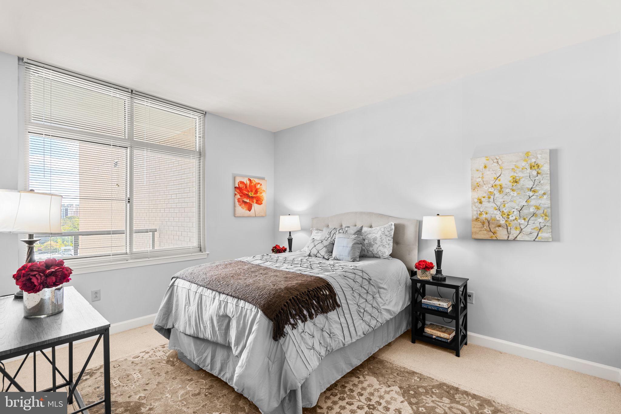 5750 Bou Avenue, Unit 1106 North Bethesda, MD 20852 - Photo 14 of 54 a bedroom with a bed and window