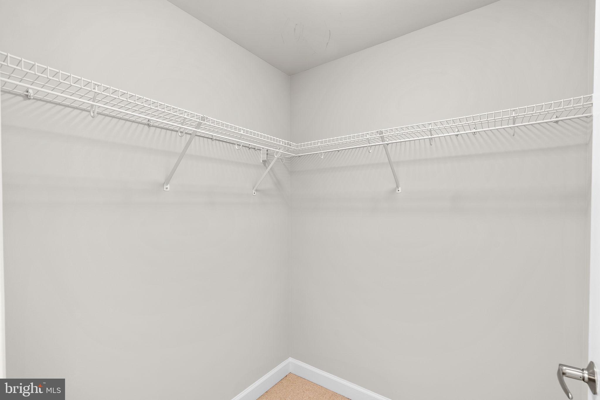 5750 Bou Avenue, Unit 1106 North Bethesda, MD 20852 - Photo 17 of 54 a view of a room with racks on the wall