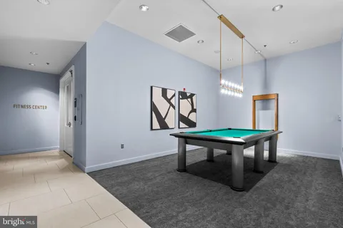 a view of a livingroom with a staircase