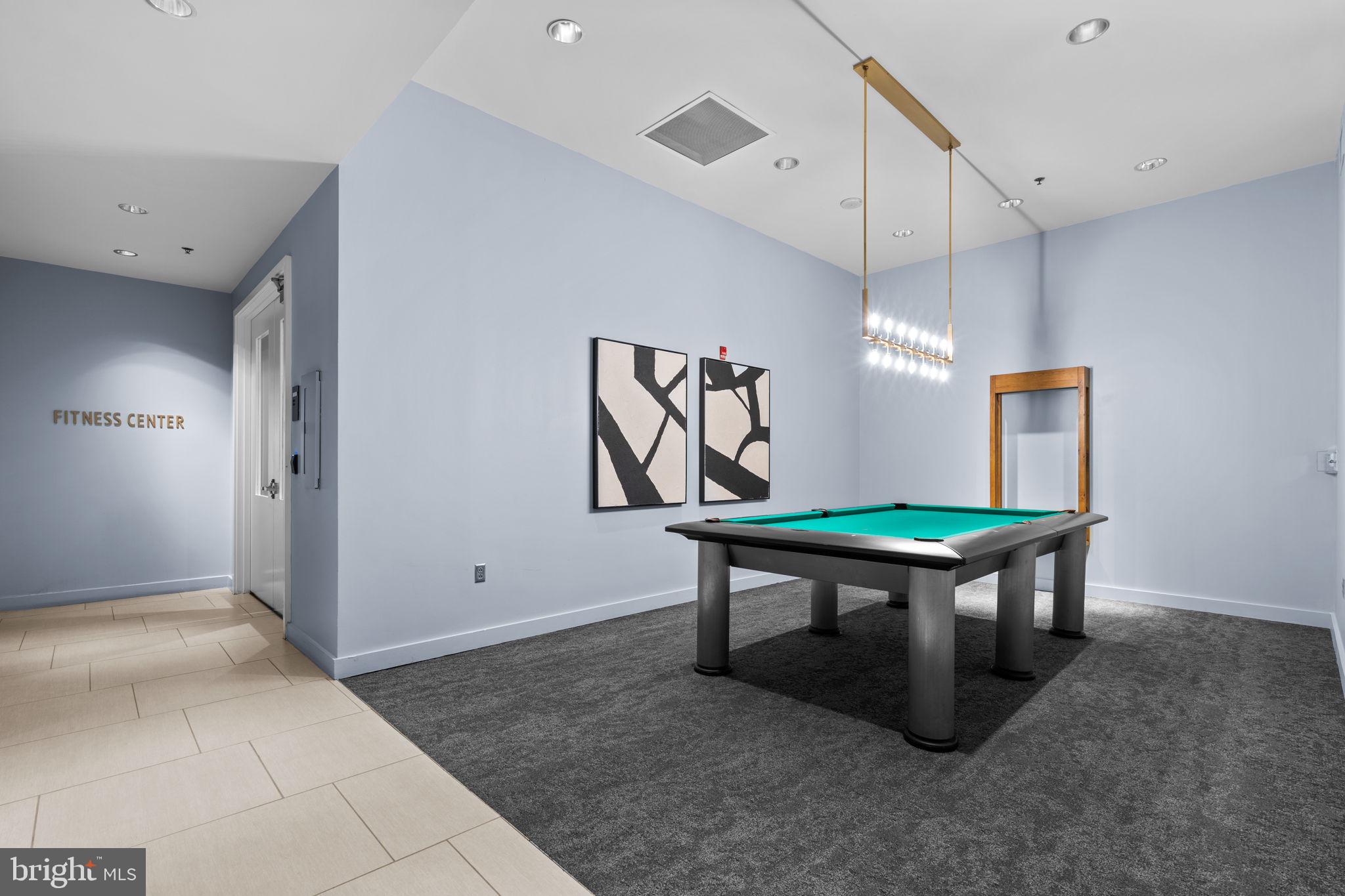 5750 Bou Avenue, Unit 1106 North Bethesda, MD 20852 - Photo 24 of 54 a room with furniture and a window