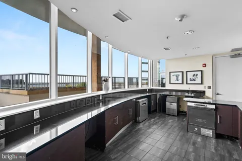 a view of a back yard of the house and front view of a house