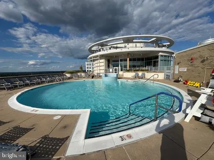 a view of outdoor space with swimming pool