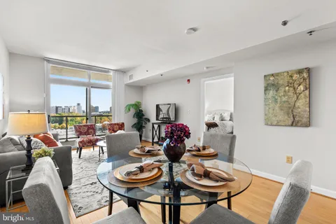 a view of a dining room with furniture window and outside view