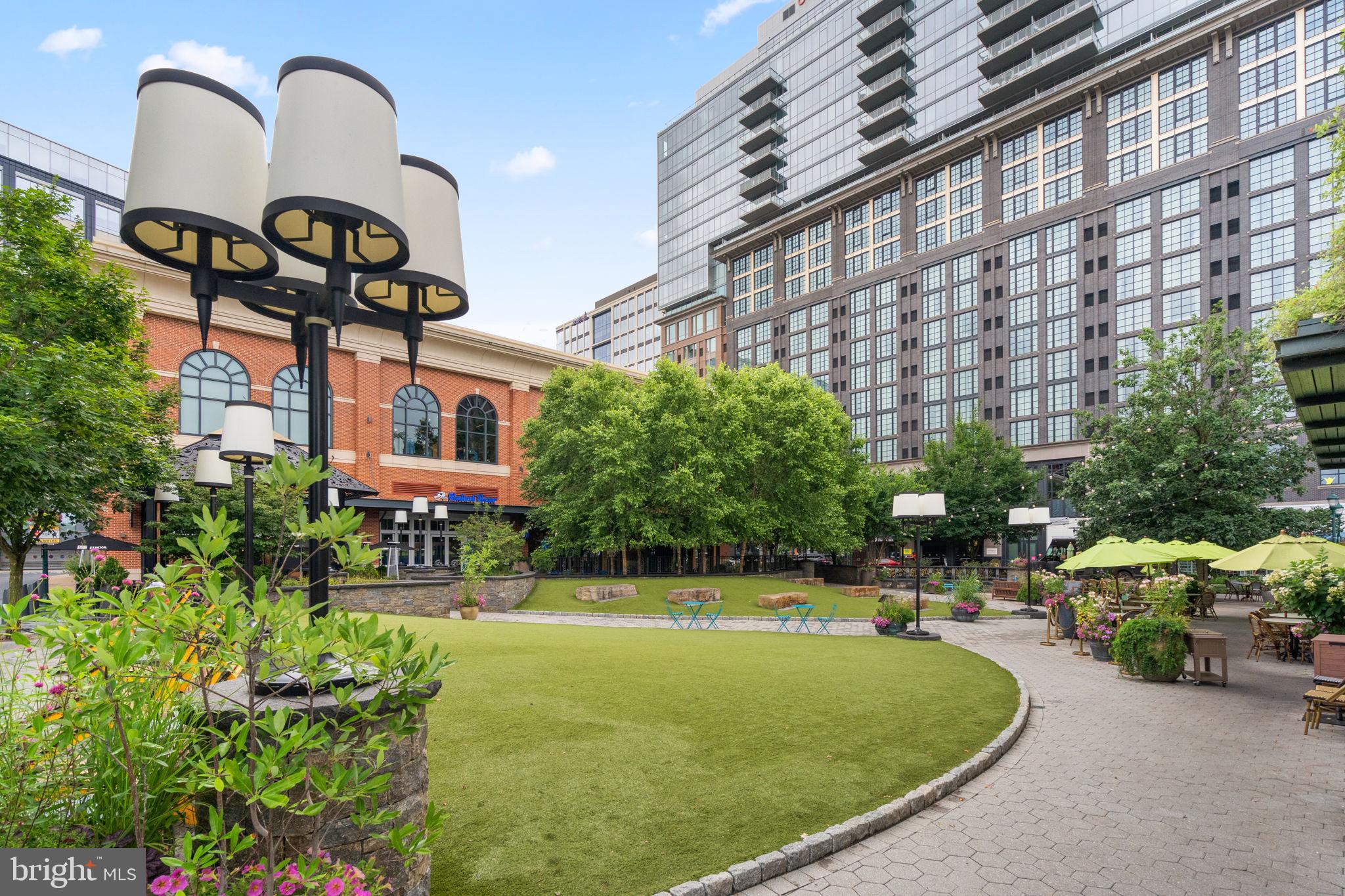 5750 Bou Avenue, Unit 1106 North Bethesda, MD 20852 - Photo 41 of 54 a front view of a building with garden