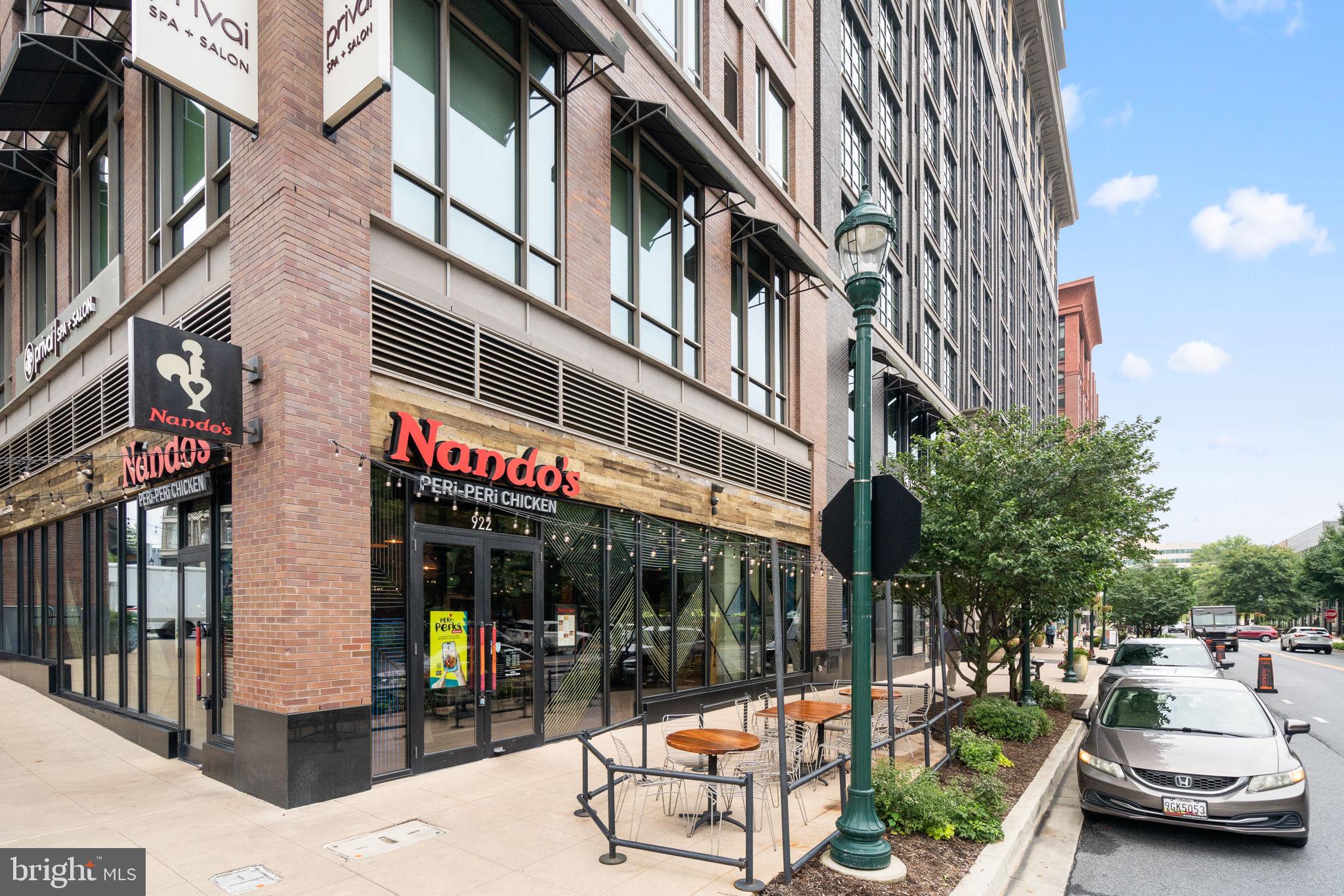 5750 Bou Avenue, Unit 1106 North Bethesda, MD 20852 - Photo 44 of 54 a view of a building with a garden and sitting area