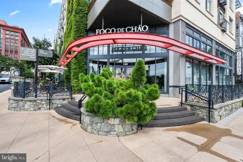 a front view of a building with a street