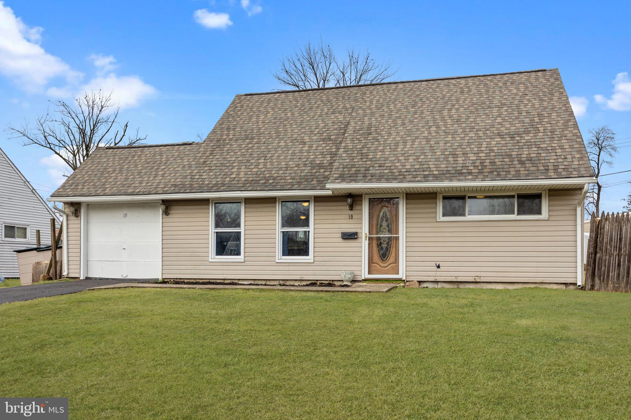 19 Violet Road Levittown, PA 19057 - Photo 1 of 26 a front view of house with yard
