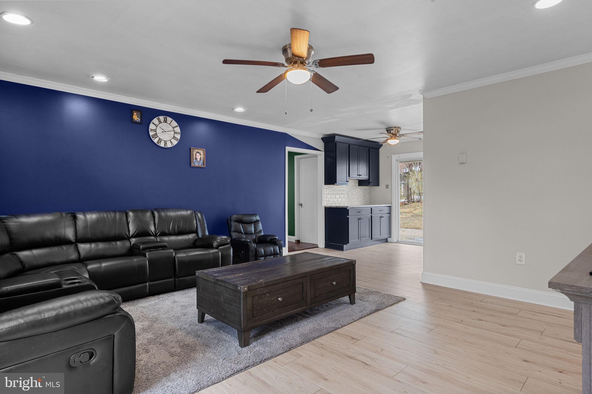 19 Violet Road Levittown, PA 19057 - Photo 4 of 26 a living room with furniture and a fireplace